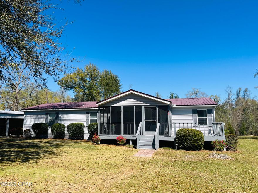 Set on a peaceful 5-acre lot, this charming 4-bedroom, 2-bathroom home offers the perfect combination of space, privacy, and comfort. The property features a mix of wooded and cleared land, with half of the acreage left natural for a tranquil, wooded retreat, while the other half is cleared, fully fenced, and ready for your outdoor projects, pets, or gardening needs.
Inside, the home provides a living room and a separate family room, offering ample space for relaxation and entertaining. The well-designed layout ensures comfort and convenience throughout, with plenty of room for all your family's needs.
Step outside to enjoy the fresh air on the covered, screened-in front porch, ideal for year-round outdoor living. The open front deck is perfect for soaking up the sun or hosting gatherings.
For added convenience, the property includes a 2-car carport with an attached workshop, complete with electricity—perfect for DIY projects, storage, or hobbies.
Whether you're looking for a peaceful retreat or a place with room to grow, this home and property provide everything you need.