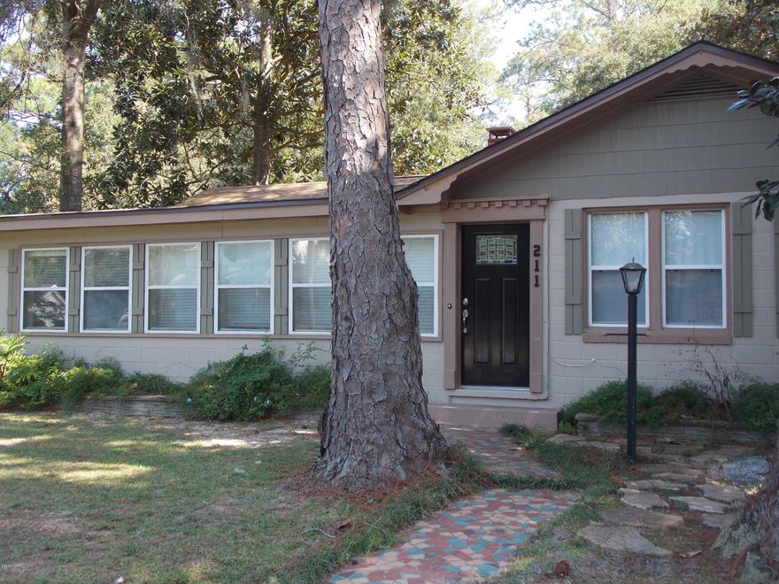 Wow...a well maintained block home with so many renovations and truly is a doll house.  There's a large two-car carport with workshop in the rear of the 100' x 150' lot...The Sellers Disclosure gives a thorough explanation of ALL 'newer' items in the house.  House is under a termite bond that is transferrable.  The yards are landscaped with trees and it's located in the central part of Lynn Haven and only one block to the bay!  This would make a great home for a young couple or if you're looking to downsize...it has a great floor plan.