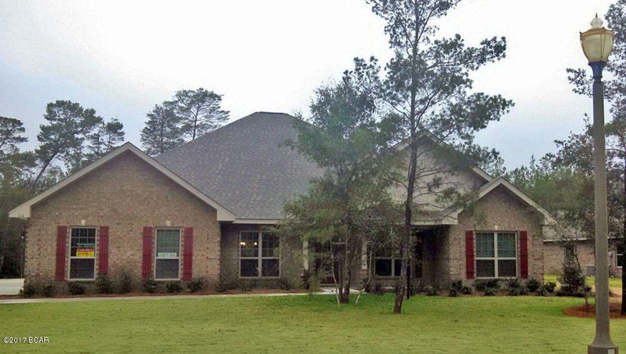 One story, square footage 3014. 4 bedrooms/3baths. 2-car garage. Dark wood, ceramic tile and carpet. High ceilings throughout much of the house; trey ceiling in master bedroom and living room. Huge open living space with wood-burning fireplace. Granite throughout. All cabinets are neutral gray. Has a large dining room and an office. Owners fenced in the back yard and put in salt-water pool installed in 2016. Beautiful landscaping with palm trees. Storage shed also added that accommodates golf cart. Golf cart friendly gated community. Lot is wooded on the back with burn pit. All owners receive access to Lake Merial for fishing boating and swimming.