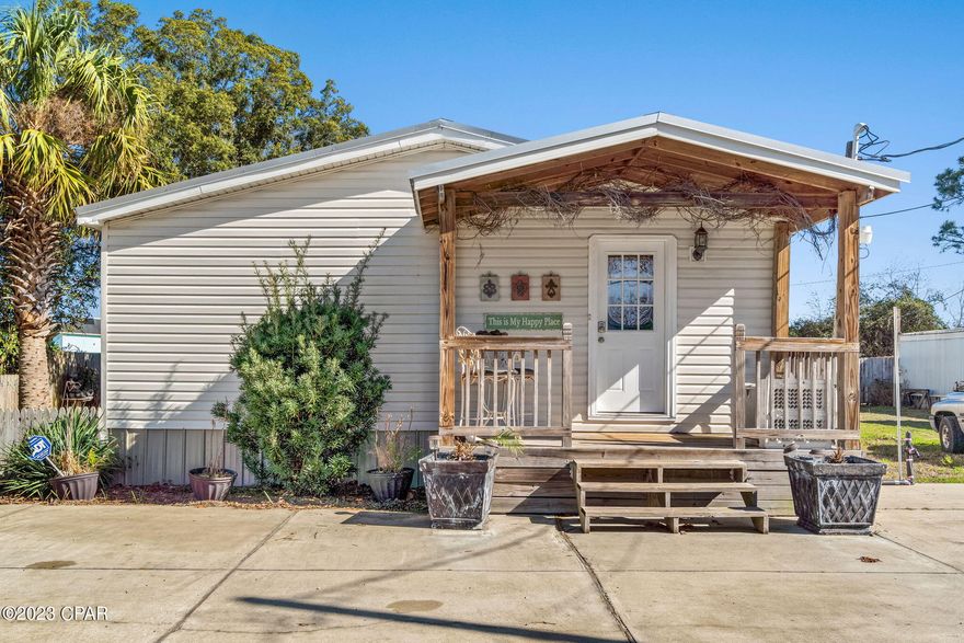 Beautifully renovated inside and out  and conveniently located in the heart of Panama City Beach. Only minutes from the sandy beaches, dining and all the attractions. You will appreciate the added parking, covered porch, side porch and outdoor living area with an additional storage shed. The inside has a huge living area with a fireplace and vaulted ceiling, eat in kitchen, split bedroom plan, two full baths and mud room utility room. New metal roof and hot water heater added in 2018. Being sold partially furnished and ready for the spring season short term rental or full time living.