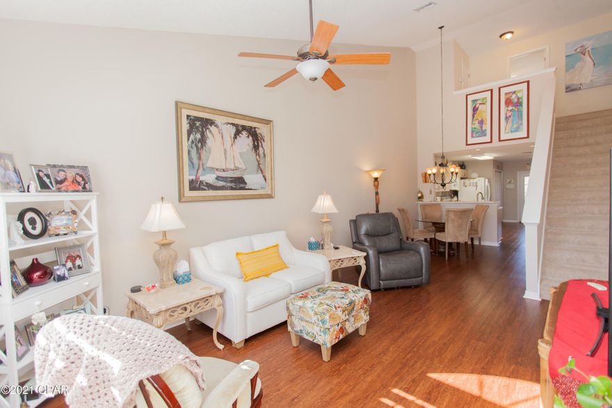 Beautiful town home located in the desirable Hammocks community, nestled in quiet cul-de-sac. Features vaulted ceiling, spacious living area and kitchen, pantry and breakfast bar. Master bedroom downstairs with private master bath and spacious closet. Upstairs features large loft that can be used for office, kid playroom, work out area, and more. 2 additional bedrooms and full Jack and Jill bath on 2nd floor. Screened in patio is perfect for entertaining or lounging overlooking huge back yard area. New roof and windows, and more, ask your agent about all the recent updates done to the home, very well maintained! This neighborhood has manicured landscaped grounds that are up-kept by HOA, sidewalks and a large fenced community pool with gazebo. Come see it before it's gone