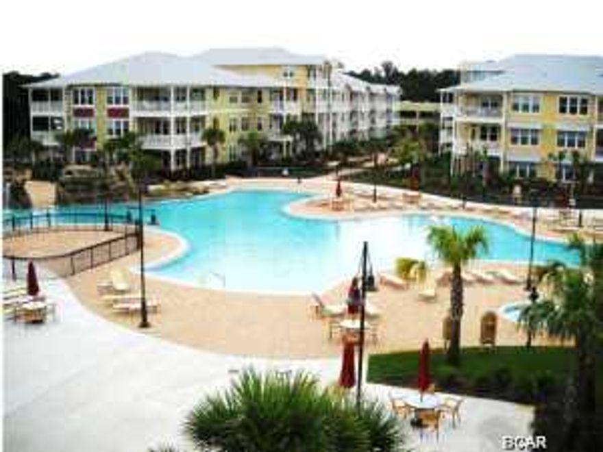 Best price in Island Reserve. Financing Available at this great Low Price.The most sought after gated Community that is not directly on the Beach. Close to the Hathaway Bridge and Navy base a couple miles to Beach and easy access to Panama City Beach Parkway. A very central location Upgrades galore including all Granite countertops, Bamboo wood floors, stainless steel appliances lots of storage. Large covered Patio and a courtyard with fountains and flowers and benches to mingle with friends. See the one acre pool from your oversized balcony enjoying incredibly beautiful upscale pool furniture around it. The gym is fully equipped with only the best equipment and the air conditioned inside Basketball court is a popular amenity as well. Your car will always be out of the sun because