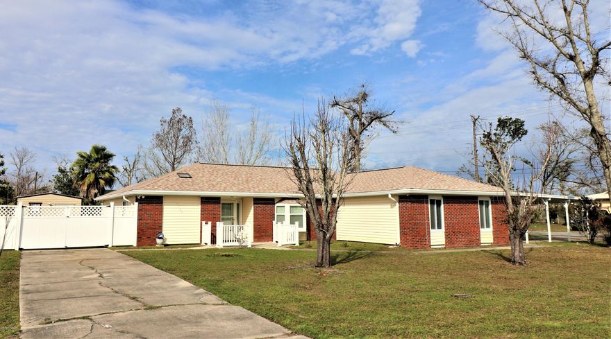 HOME IS CURRENTLY UNDER CONTRACT, SELLER WILL CONTINUE TO SHOW AND TAKE BACKUP OFFERS. This is a must see Move In Ready Home at a GREAT Price!!  Home has many new features such as New Roof, Chimney cap, Mostly all new windows, privacy fence, Kitchen cabinets and counter tops, interior paint, baseboards and screened in back patio!!  Additional features include but not limited to large tile flooring throughout home, wood burning fireplace, gutters, covered parking and lets not forget the Awesome 20 x 14 Storage building already wired!! This home is centrally located, close to Tyndall AFB, shopping, doctors, hospitals and some of the most Beautiful Beaches you will ever see and so much more! Thank you for considering this home. All information should be verified if important.