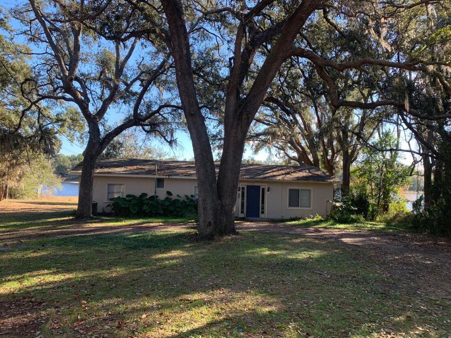 LEASE TO PURCHASE OPTION ON THIS AMAZING WATERFRONT HOME on a double lot.  This home is SOLID cinder block, and built like a bomb-shelter.  Tile flooring through out.  Enjoy multiple views of the lake from inside, or venture outside  and enjoy the space  and quiet atmosphere! This double lakefront lot is at the end of Lucy Ln on Banks Lake. The lake allows motorized boats and is loaded with fish. The location of this home is only minutes to the new Beaches International Airport, and just 10 minutes north of Lynn Haven on Hwy 77. Also, note that this is in the very popular Bozeman school district.