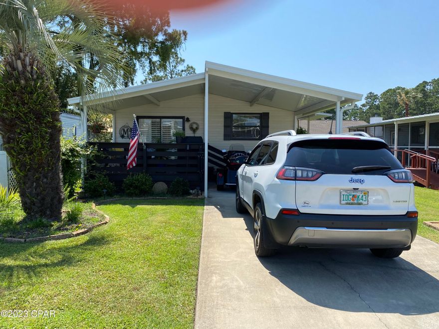 Currently under contract    Taking backup offers 
Seller very motivated!  As Is ! Charming manufactured home in an over 55 community plus you own the land, too! The community has been well cared for with a well run Home Owner's Association and yes, great reserves. Community also boasts a heated pool, community room, grounds for gatherings and fire pit and a gated storage area for your boats and RV's!! This home has a great kitchen with appliances remaining,  with  dining room and a beautiful deck to enjoy the beautiful weather. Washer and dryer remains! . New  storage shed in the back yard. Carport is here, too adjoining steps leading to sliding glass door. This is a must to come and see! Cash and conventional only.  Buyer must be 55 or older and occupy the home. This is a beautiful, well-kept, quiet 55 + community in the heart of Panama City Beach. This community provides easy access to all Panama City Beach has to offer, but tucked away off the beaten path. The community features a heated/cool pool, clubhouse and a private street (with no through traffic)! Golf cart friendly and fun friendly! The HOA covers water, trash, sewer, basic cable, irrigation and the pool and clubhouse usage! Two    bedrooms and two bathrooms at the back of the home.