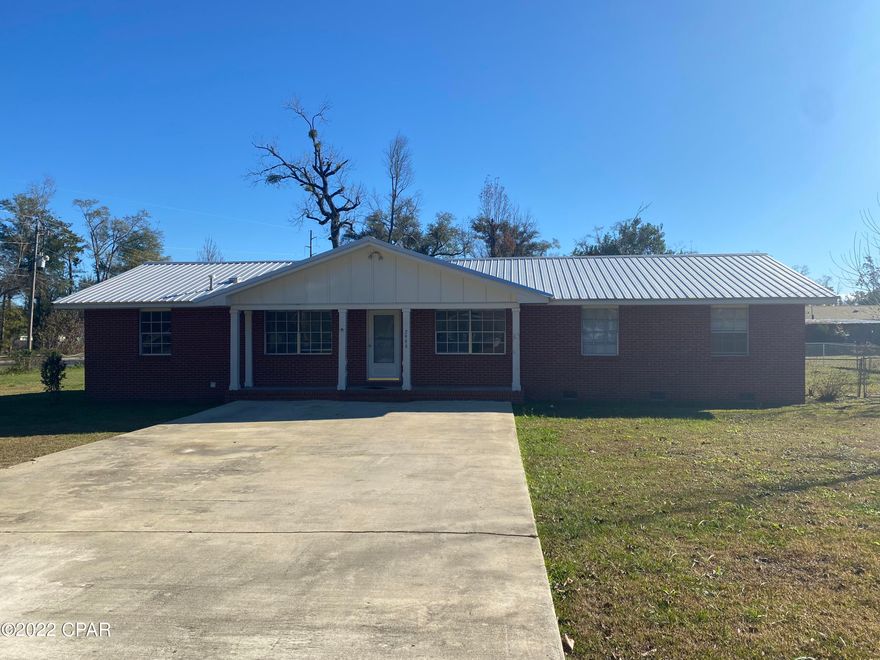 PROPERTY UNDER CONTRACT; SELLER TAKING BACKUP OFFERS. Turnkey 3 bedroom, 2 bathroom brick home in downtown Marianna. This home sits on a corner lot on a quiet street with a large back yard. It has a spacious living room, eat-in kitchen, nice sized bedrooms, and master bedroom with en suite bathroom. There is also an attached one car garage. The home has been freshly painted and carpet has been cleaned. This home is conveniently located close to Jackson Hospital, Marianna K-8 and MHS. The roof was replaced in 2019.