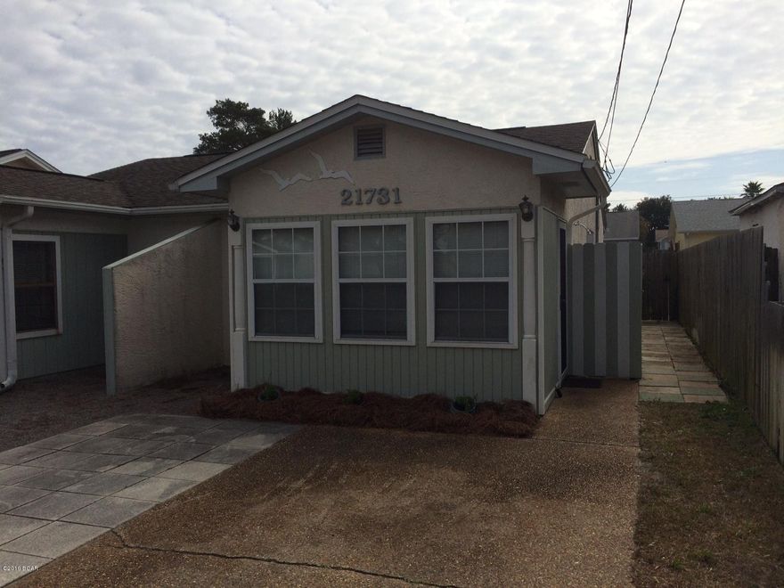 Fantastic 1 bedroom beach duplex unit located just a few blocks from the beach. This unit is a 1 bedroom 1 bath furnished unit with a nice Florida room, open living room, dining room, kitchen area, and includes a washer and dryer (not warrantied). There is a small patio in the fenced back yard and a ''beach shower'' on the side of the unit.