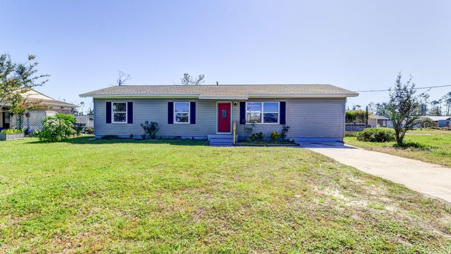 LYNN HAVEN HOME PLUS DETACHED GARAGE/WORKSHOP! The interior of this charming home features 4 bedrooms, 2 full baths, an open floor plan with split bedrooms, ample natural light and interior laundry. The kitchen boasts an XL island, stainless steel appliances, and a pantry. The entire home has new Vinyl Plank flooring (no carpet). The exterior features a 0.46 Acre Lot, a back deck for entertaining, a detached 864 SF garage with workshop and a screened patio with hot tub (not warranted). New Roof on House and Garage! This home is located near schools, shopping, restaurants and more. X Flood Zone. No HOA. Call today for your own private preview.   Information derived from public record and owner; measurements approximate.