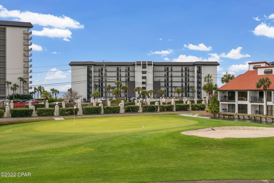 CURRENTLY UNDER CONTRACT, SELLER ACCEPTING BACKUP OFFERS.   This highly sought after Edgewater Villa could be yours. Your balcony overlooks the green of the first hole and provides you with a partial water view as well!  This 2/2 condo has had only one owner since being built, never rented and only used a handful of months out of the year as a vacation home. Located close to walk-overs, pools and the mailbox. This unit will not last long! Edgewater amenities offered are as follows: 12 pools, tennis, golf, pickleball, hot tubs, restaurant, coffee and an ice cream shop all for your enjoyment! The private heated Villa pool is just steps away and the beachfront amenities a quick stroll. All villa owners have full privileges to the resort's amenities including sports club.