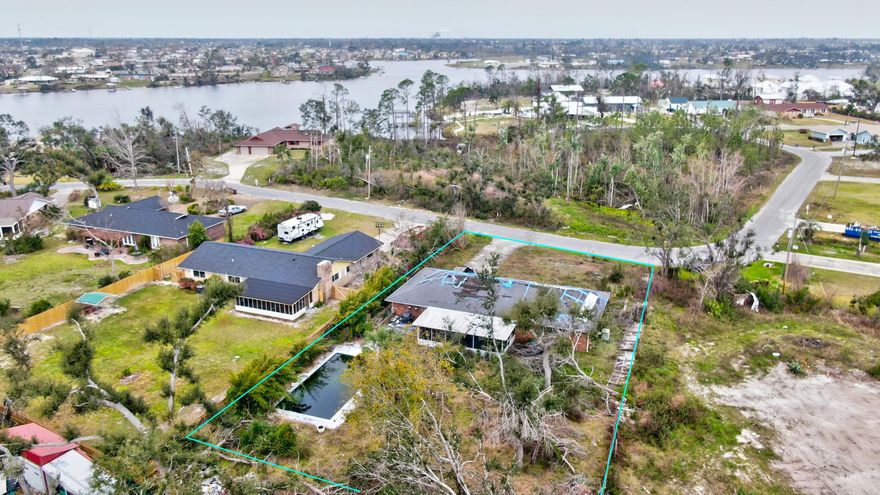 Currently under contract - accepting backup offers. POTENTIAL ALERT!!! BRING ALL OFFERS!!! This all brick home is located within walking distance to the bay that accesses the gulf, located near Tyndall Air Force Base, and is ready for a remodel! This property has right at half an acre with inground pool, a nice - large 24 x 14 screened in porch overlooking the pool, custom cabinetry, and plenty of space inside. The home has had some damage from the hurricane. Call to see this one today, before it's gone! Age, square feet, lot size, all dimensions approximate, please verify if important. Foreclosure - seller has no knowledge of property.