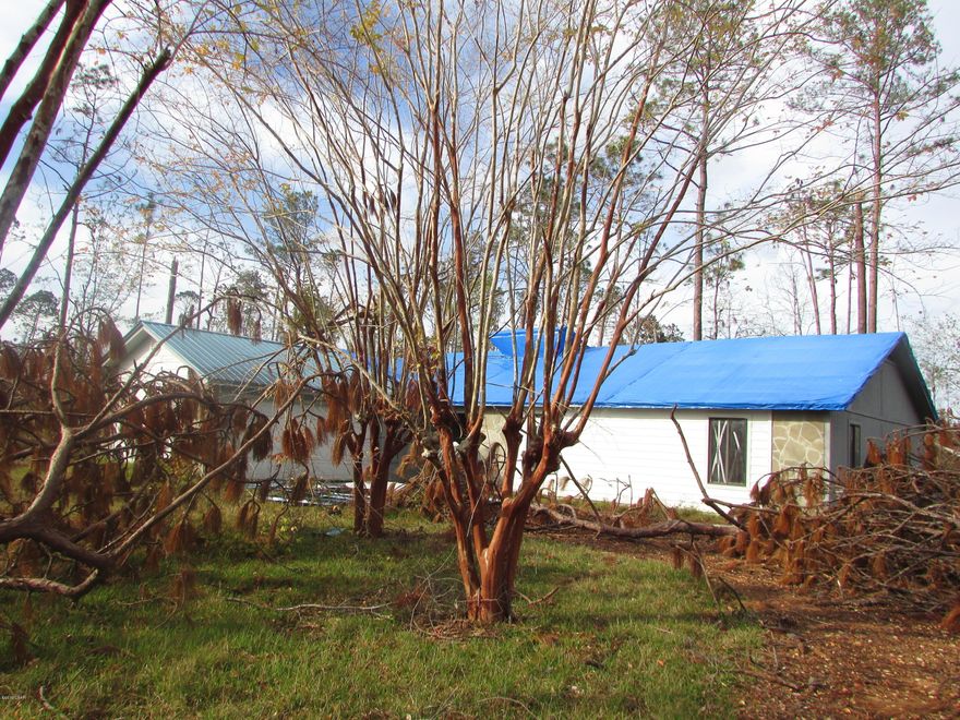 Large family home ready for you family! 3 bedroom 2 Bath with 1736 sq ft under air! Located on 1 acre with City water & sewer. Hardwood & tile floors. Breakfast bar in kitchen with plenty of cabinets. Large Laundry room. Home is ready to move into with no major repairs needed. 2 Car attached garage. Close to all Shopping! Home will not last long! Call today!