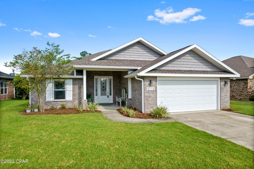 A beautifully maintained 4 bedroom home with a split floor plan in the very popular Camryn Crossing subdivision. This family friendly community offers sidewalks, a playground and a safe place for children to grow and have fun. Built in 2015 by one of Bay County's best builders: Southern Living Homes, the home was built with superior construction built to last a lifetime. A large screen porch was recently added and is the perfect place to enjoy backyard sunsets and relaxation. The backyard backs up to a pond so you never have to worry about neighbors in the back and is large enough to add the pool you have always dreamed of! Come see what this great community has to offer and how it can be the perfect fit for your family!