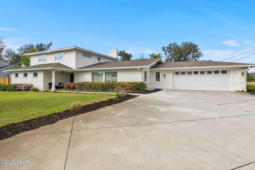 Welcome to an incredible opportunity to own a home in the heart of the Cove neighborhood, across from the Bay on a corner homesite! With NO HOA, this home is a rare find in the Cove and features a gorgeous saltwater-heated pool/spa, 2-car garage and over 3,000 square feet of living space. With 4 bedrooms, 3 full bathrooms and 2 half baths, this fully-renovated home offers ample storage, large closets, oversized bathrooms and high-end features throughout. Best part - it's on one of the most desirable streets in the historic Cove neighborhood!

Step into the entryway and you're greeted by an open concept with consistent flooring throughout, a large kitchen island, a brick-clad fireplace and large windows flooding the great room with natural light. This home was designed for entertaining! The expansive kitchen features an abundance of custom kitchen cabinets, granite countertops, Kitchen Aid and Frigidaire Professional appliances, a full-size walk-in pantry, wine refrigerator and a large kitchen island open to the living room and dining room. The living room with a brick fireplace features double French doors that lead to a covered patio and a stunning saltwater-heated pool and spa. The oversized great room has an accessible powder room for guests and also allows for a sitting room, additional family room and is open to the dining room, just off of the kitchen. 

The main level offers a primary suite with French doors leading to the patio, a large walk-in closet with custom built-ins and a spacious en suite bath. The en suite bath has a walk-in tiled shower, separate soaking tub and double vanities with quartz countertops. The upper level offers 3 additional bedrooms, two full baths and a half bath. This is an incredible option for guests or family members who share a bathroom with 3 vanities available on the same level! One bedroom has an ensuite full bath and a large walk-in closet with built-ins. Two guest bedrooms share a full bath and powder room accessible by the hallway. Consistent flooring throughout the upper level creates a great flow for the home. The bedrooms upstairs also offer great views of the Bay! 

The backyard is a true oasis! The covered porch is great for entertaining...imagine cooking s'mores and watching the kids play in the pool year-round. With a heated pool and spa, you will enjoy this great amenity with your friends, family and neighbors all year long! The corner homesites allows a large yard with lush landscaping and sod. A unique feature of this home is also a climate controlled storage room over 200 SF, accessible by the back yard. This gives the option to store items or also expand the primary bedroom walk-in closet for additional space or a larger laundry room. Possibilities are endless!

With a full interior renovation in 2021 and a full exterior renovation in 2022, this Cove home has been completed remastered! 200 Hollis Avenue has a beautiful white brick exterior, a unique and super functional drive-through 2-car garage and a luxurious pool. Extensive landscaping has been added to the home and a lovely addition of mature oak trees that complement the Cove neighborhood. There is a shallow well, an irrigation system with 4 zones and newer pool equipment. 

The Cove is a well-established neighborhood covered with hundred year oak trees and lovely neighborhood parks. With no HOA, this is a great place for those who wish to have all the toys, for kids and adults alike. This is a great opportunity to live in the Cove!