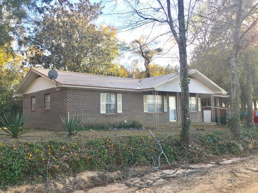 Perfect for your retirement home or if you are just starting out and looking for your first house.  Brick with metal roof and has 3 bedrooms, 1 bath, a good size kitchen, laundry room, carport and even a large outside storage building. Room enough for a garden.  Located on a country road, not far from pavement and not too far from HWY 231.

Ouside air handler is missing.

Short sale.