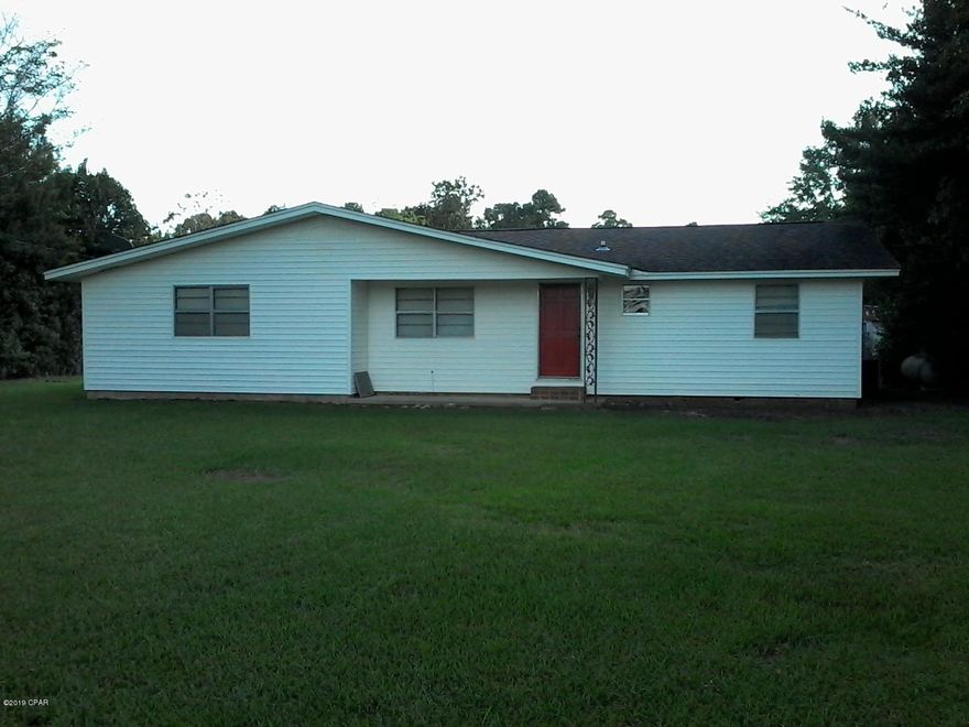MOTIVATED SELLER ... Country style living !! This 3BR, 2BA, house offers a 300+feet deep private well, 2 private septic tanks and sits on .46 of an acre with U.S. Highway 90 road frontage.  Large inside utility room with washer/dryer hook-up, family/dining room combo, separate formal living room.  Need storage, you got it, lots of kitchen cabinets, even 2  built-in corner cabinets in family room area. Large outside enclosed workshop with more storage, part insulated and part enclosed non-insulated both sides with power hook-up available.  This home has been very well maintained and is in excellent condition.  A MUST SEE !!  Call listing agent for appointment.