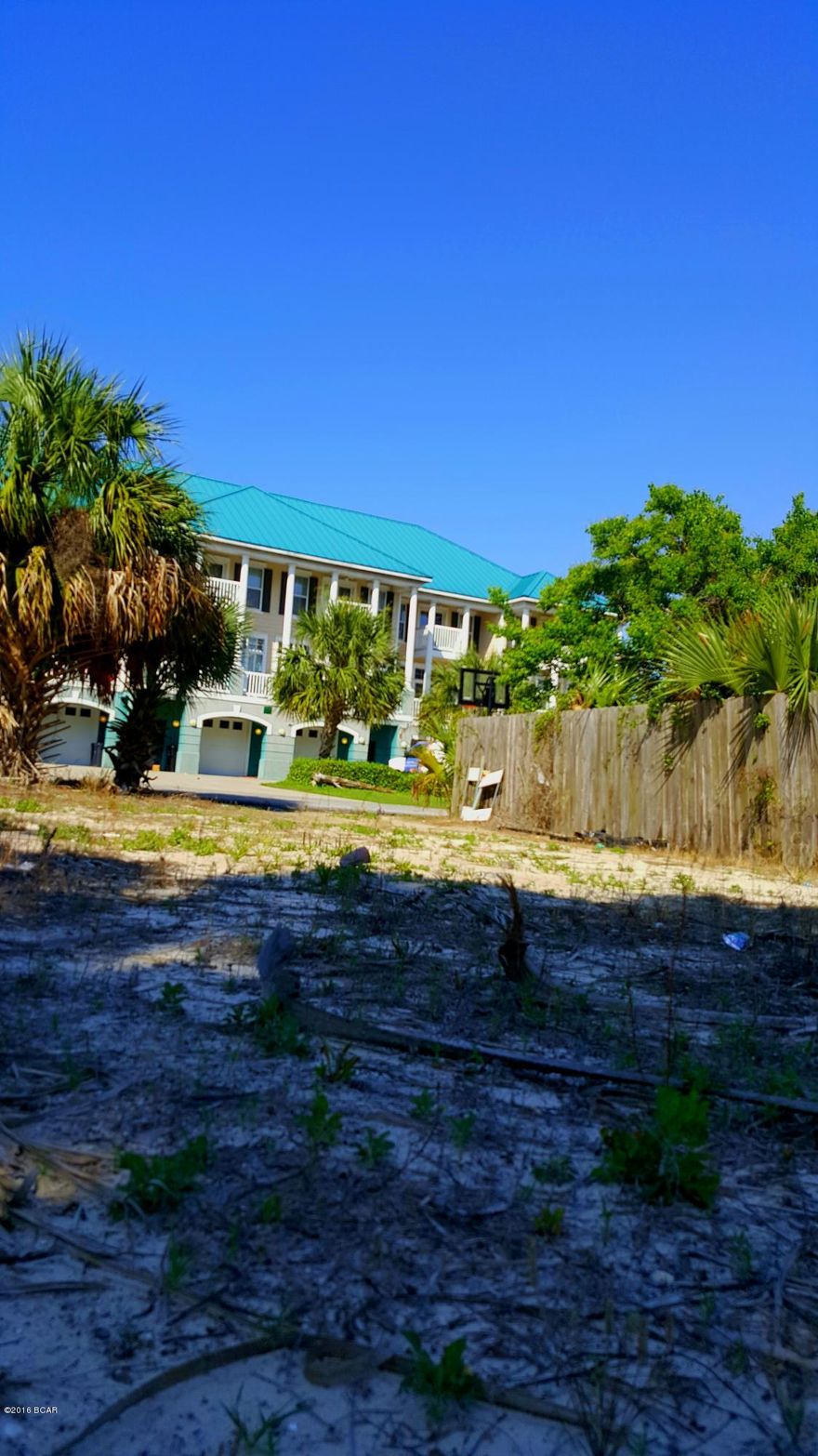 One of the few remaining vacant lots available, SO close to the beach, on the east side, near the action! So many options; build, put a tiny-house, set up your mobile.