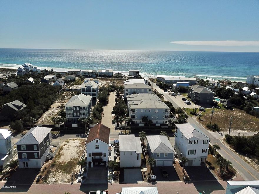 Under contract but accepting back ups~~This beautiful beach home is just right for your family. It is located on the South side of Hwy 98 just 2 blocks from the beach entrance. The home has the master bedroom on the first floor along with the kitchen, dining room and living room. Upstairs has a second master suite with its own bathroom and its own outdoor living area. The third bedroom boasts two built in bunks with built in storage below. There is plenty of room for an office as well. Once you enter your back yard oasis you will enjoy a 5' deep salt water Sip & Dip pool that can also be used as a hot tub. The pool comes with a light that changes color for great evening effects.Tankless gas water heater and a whole house water softener