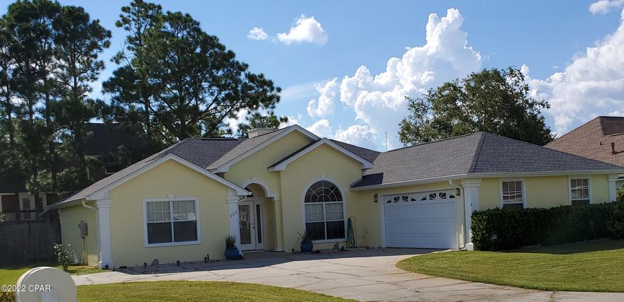 CURRENTLY UNDER CONTRACT, SELLER WILL CONSIDER BACKUP OFFERS.      *****Location, Location, Location***** This home is located in a very desirable neighborhood that is only 1 mile to the Navy Base, 3 miles to the most Beautiful Beaches in the World, and close to many restaurants, groceries, and entertainment! NO HOA FEES!!  This home has many extras and a great floor plan with split bedrooms and a SIDE ENTRANCE garage. Newly painted inside and out with new flooring. A large covered back patio with hot tub is a plus. 

Contact your Agent today as this home is VACANT and Ready to Show.