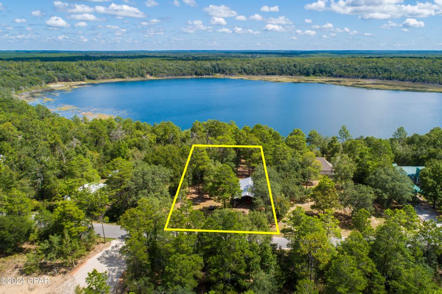 Beautiful 1 acre Lakefront lot with pole barn, on Lake Suzanne in the gated Leisure Lakes Community. Neighborhood has an HOA but includes lots of amenities including, security,  gated entry, community pool and picnic pavilion, basketball court, tennis courts, boat launch and playground.