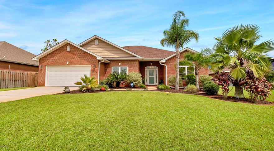 This custom, solid brick house feels like HOME!  You'll appreciate the open, split bedroom floor plan with plenty of space, comfortable living, quality finishes and a backyard that feels like an escape! Buyers will be glad to know that the owners have taken much pride in caring for this home. It is well maintained, clean, smoke and pet free!  Features that add to the character of the home are raised tray ceilings, accent tile flooring, upgraded fixtures, electric fireplace, crown molding, accent chair rails, and bull nose corners to name just a few. The kitchen offers decorative backsplash, stainless appliances, ample cabinetry, and lots of counter space for the family chef.  Enjoy a snack at the breakfast bar or in front of the bay window and host those holiday dinners in the formal dining room. Not into formal dining? Use this area for an office or play area for the kids. The master suite gives you plenty of space for that king-sized furniture and the walk-in closet is great for all those shoes! The en suite is decked out with double vanities, relaxing whirlpool tub, tile shower and extra linen storage. All 3 guest rooms are also good size! The laundry room has added shelving for storage or pantry space.  BUT WAIT - oh the back yard! The yard is your own escape to paradise! The above ground pool has built in decking and is perfect for a hot day. The pergola, covered patio, privacy fence and beautiful landscaping all add to the ambiance for a quiet night with your love or a fun get together with friends. There is also a small shed for storage of those lawn tools. This home is in a perfect location, on a quiet cul-de sac and in central Lynn Haven  close to shopping and top-rated schools.  As a bonus, the home has a new roof, new pool pump, Ring doorbell, large driveway and a designated well for irrigation. The sellers are offering a one-year home warranty for buyers' peace of mind! All measurements approximate, buyers to verify if important.