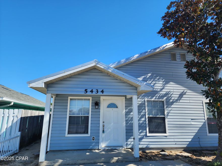 WALK TO THE BEACH! This 2 bedroom, 1 bath duplex is conveniently located to the beach. Property features LVP flooring, new windows and back door in 2024, laundry room, fenced back yard and storage shed. Property is on septic system.  1 small dog or cat $250 pet deposit/$50pet fee/$25 month pet rent.