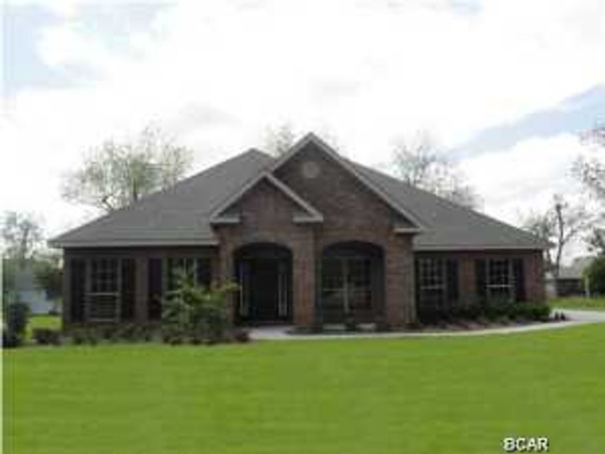 THE MODEL IS FINALLY FOR SALE!! YOU KNOW YOU'VE HAD A BUYER ASK TO BUY THIS HOME, WELL.....NOW THEY CAN!!!THIS IS THE BUILDERS LAST ACRE LAKE LOT!!! The McKenzie floor plan is absolutely our bestselling plan! Upon entering the foyer you will realize that this home is like no other. The wide foyer with double arches setting off the dining room is every elegant. This home was designed with entertaining in mind. The family room and kitchen are open to each other with a long wrap around bar dividing the space. You will love preparing family meals in the gourmet kitchen with stainless steel appliances, 3 cm granite, designer cabinets, and a huge island. There is a covered back porch that is 24 foot wide overlooking the beautiful corner lot. are looking for: garden tub, separate tiled shower, linen closet, and walk in closet, water closet, trey ceiling and an entry way onto the back porch. On both sides of the house you will find double bedrooms and adjoining baths for the four secondary bedrooms. We have added 5 inch hardwood to the study, foyer, and dining room. The foyer, dining room and master have crown and the tile in all the wet areas is 20 inches. All homes include 2 1/2'' faux wood blinds, a sprinkler system, hurricane fabric shields and a 10 year Bonded Builder Warranty.