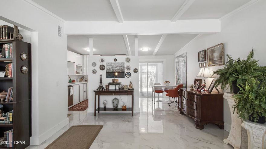 CURRENTLY UNDER CONTRACT, SELLER ACCEPTING BACKUP OFFERS

4 Bedroom DUPLEX on west end of the beach. SHORT TERM RENTALS ARE ALLOWED. Live in 1 side & receive passive income from the other or rent out both sides short or long term. GREAT LOCATION- just 1/2 mile to the sandy beach & 1 mile to Pier Park for tons of shopping, restaurant's and entertainment. Each side has 2 bedrooms, 1 bath, family room, kitchen &  laundry area.  Side 1 has a entry off the front of the home and features a study as well. GLASS FRONT CUSTOM cabinetry, QUARTZ countertops, Calccatta MARBLE floors and a large covered porch off the back of the home. Side 2 entry is on the side of the home which adds a sense of privacy. All tile throughout. Big CORNER LOT and fenced in backyard. Sold mostly furnished.