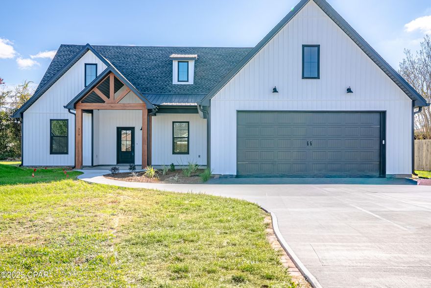 This new construction, quality-built home is located close to the exciting new SweetBay shopping complex, offering both convenience and comfort in a rapidly growing area. Designed for modern living, the home features a durable vinyl siding exterior and energy-saving spray foam insulation. Inside, you'll find beautiful waterproof LVP flooring with a 22-mil commercial/residential wear layer—perfect for high-traffic and everyday life. The master bathroom showcases elegant porcelain tile, complemented by granite countertops and crisp white shaker-style cabinetry throughout the home.

The kitchen is outfitted with reliable Delta plumbing fixtures and a Moen faucet, providing a stylish and functional cooking space. A 50-gallon water heater and a 3-ton, 17 SEER HVAC system enhancing the home's efficiency and year-round comfort.

For added value, the property includes a 250-foot deep water well, a septic system with lift station, and an oversized 18-foot garage door offering ease of access and ample storage. Modern black electrical fixtures add a sleek finishing touch.

This home blends craftsmanship, durability, and location—making it an incredible opportunity in one of the area's most exciting new districts. Luxury details continue throughout:

Rigid core luxury vinyl plank flooring in main areas

Ceramic plank tile in all bathrooms

Brushed nickel fixtures and a modern neutral palette of grey tones with crisp white trim

The primary suite is a retreat of its own, featuring a soaking tub, a custom tile shower, and Delta fixtures. A thoughtfully designed walk-in closet connects directly to the laundry room for convenience. Spacious secondary bedrooms include one with an en suite bath, offering comfort for family or guests.

Additional highlights include an oversized two-car garage with side yard access and ample storage.

This home is the perfect blend of luxury, comfort, and convenienceready to be your forever home.