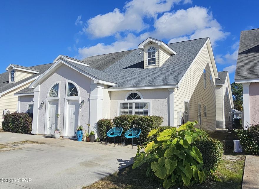 Priced to sell fast! Welcome to your private beach community in the popular Palm Cove, just ½ mile from the sugar-white sands and emerald waters of the Gulf Coast! This beautifully updated 3-bedroom, 2.5-bath townhome offers the perfect blend of modern upgrades, low-maintenance living, and an unbeatable location. Step inside and immediately feel at home. The open-concept first floor greets you with soaring vaulted ceilings and an abundance of natural light pouring in through the dramatic half-moon window in the living room and above the entry door. Luxury vinyl plank (LVP) wood-grain flooring flows throughout the main living areas, complemented by ceramic tile in the foyer on entry. Brand-new wood stairs with rich chocolate stain lead gracefully to the upper level, adding warmth and sophistication. The heart of the home is the bright, updated kitchen featuring durable Maytag appliances, ample cabinetry, and easy access to dining and living spaces — perfect for entertaining or quiet evenings in. With the primary living spaces and owner's suite conveniently located on the first level, this home lives like a single-story while still offering two additional bedrooms and a full bath upstairs for guests or family. Key recent upgrades for peace of mind: Brand-new architectural shingle roof installed May 2024, A/C system only 2 years old. Insurance premiums low as flood insurance is not required (Zone X)


Outdoor living & community perks:
Enjoy resort-style amenities with a gated community and two stylish pools surrounded by lush landscaping. Spend your days at the beach (a quick ½-mile stroll or bike ride away), then rinse off and relax poolside. Priced to sell and ready for immediate occupancy — don't miss your chance to own a turnkey coastal gem with major systems already updated! Schedule your private showing of 183 White Cap Lane today!