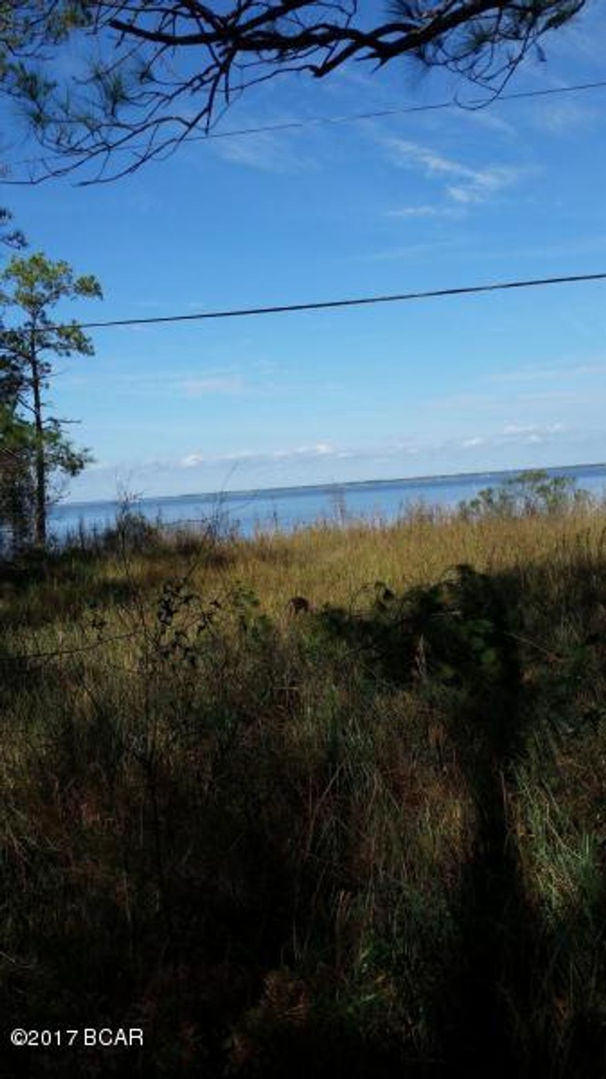 Two beautiful building lots in quiet neighborhood with exceptional 2nd and 3rd floor views over the Choctawhatchee Bay. Cant find any better water view priced lots in South Walton.