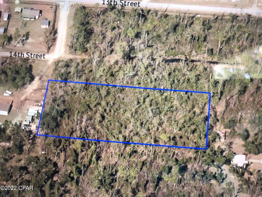 2 acre site ready for your new home or up to 4 home sites.   County zoning. Well and septic needed. Public water is available on 13th Street. Located less than a mile from Donald Penny deep water boat ramp and park. Additional 1.82 acre parcel available contiguous to this lot giving you a possibility of 7 residential .5 acre plus homesites (MLS # 729764) plus another 16 lots zoned R-2 at MLS 716366.