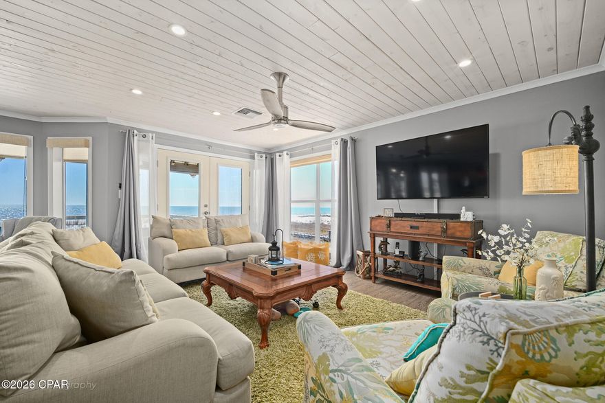 Set on the sand along CR 30A, 6986 CR 30A in Port St. Joe delivers the direct beachfront feeling: salt air, open water, and a horizon that becomes your backdrop all day and night. Even better, this home's flood policy is assumable at a very attractive premium! Inside, the remodeled interior features solid surface countertops, tongue-and-groove ceilings, and upgraded lighting for a bright coastal vibe. Two large bedroom suites, both of which face the Gulf to maximize views, also feature their own private living areas. Step outside to the updated balcony and decking with both screened and open air spaces for coffee at sunrise, shade in the afternoon, and sunset color over the Gulf. Sold fully furnished and not used as a rental, the home shows pride of ownership and is ready to enjoy right away. The shoreline here is known for calm, walkable beach days through the seasons, plus dog-friendly beaches for morning and evening strolls with sunrise and sunset views just steps from your door. Minutes to Money Bayou and the Indian Pass boat launch for boating, fishing, and exploring the coast, and a short drive to Cape San Blas amenities and the State Park, as well as downtown historic Port St. Joe for shopping and dining in style. AE flood zone. No HOA. See the 3D tour for an easy virtual showing! Contact for more details and private showing.