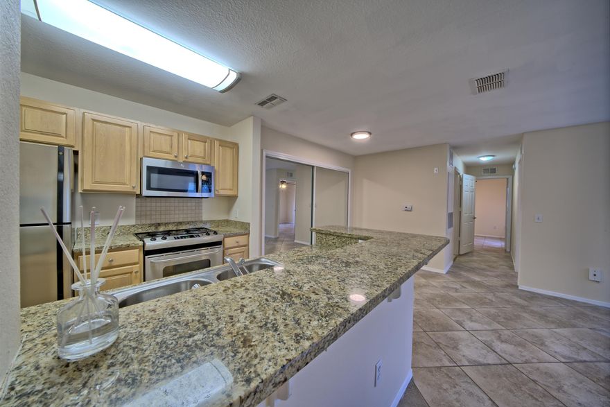 UNDER CONTRACT / SELLER ACCEPTING BACK-UP OFFERS. This 3 BEDROOM 2 BATH condo has been nicely renovated and is in MOVE IN CONDITION !!!. This split bedroom floor plan  has TILE FLOORING THROUGHOUT, Granite counter tops, stainless steel appliances, new paint, new light fixtures, new ceiling fans, new window coverings, new roof and the list goes on and on. NAUTILUS COVE is a FANTASTIC GATED COMMUNITY with fantastic amenities which include a large resort style pool, fitness center, club house with a full kitchen, children's playground, pet friendly walking stations and is LOCATED in THE HEART OF PANAMA CITY BEACH. This FANTASTIC location is WALKING DISTANCE TO THE BEACH and is less than 1.5 miles to PIER PARKS, shopping, restaurants, entertainment and all the beach has to offer!