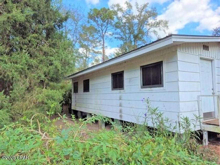 The home comes with 2 bedrooms and two full baths. Home has two additional rooms that could be used as bedrooms (no closets in those rooms). There are a couple of sheds for added storage or workshops. Located on a quiet road just off Highway 90 on the west side of Chipley and close to schools, restaurants, and shopping.  Only 1 hour to beautiful Panama City Beaches. Roof is approximately 3 years old.  List price reflects needed repairs.