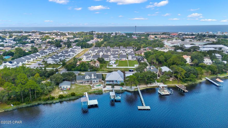 **TAKING BACK UP OFFERS UNTIL CONTINGENCY FULLY REMOVED***CUSTOM LAKE FRONT HOME WITH PRIVATE DOCK, BOATHOUSE FEATURING 6K pd REMOTE BOATLIFT, AND PRIVATE BEACH ON SOUGHT AFTER LAKE POWELL! Owner Finance option up to $500k.  Minutes from Inlet Beach and famous 30A shopping and dining.  1 mile stroll to gulf access 95! Follow the private driveway to a meticulously maintained thoughtfully designed move in ready masterpiece.  NO HOA! 3 car garage with plenty of storage for beach toys, golf cart and more! This home is impeccably designed ICF construction with high efficiency R value @R24 which contributes substantially to insurance reductions and security along the coast! Hurricane grade windows and doors.  Low maintenance professional landscaping from the front curb private driveway entrance, to the front of home beautiful fountain, to the lakefront custom private sea wall and beach. This home could easily be privately gated and currently features privacy wood fencing.  Exterior irrigation is supplied from well water. The large back deck and temperature controlled 4-season massive back porch features deep water lake views. As you enter the home it looks and smells brand new featuring durable wood grain LV flooring throughout. Built in entertainment center featuring electric fireplace.  Custom shelving with secret hidden bookcase perfect for storage or safe...or wine cellar, or your personal creative ideas.  MASSIVE laundry room with sliding door on main level features storage cabinetry.  Two main level guest suites with Jack and Jill adjoining baths. Plus additional half bath in common area for guests.  Owner's suite is on opposite side of home on main level featuring an elegant full bath with two vanities with custom sinks, walk in shower, and incredible lighting.  VIEWS of Lake Powell outside the full length double windows are by far the best feature! The kitchen features quartz countertops with designer backsplash, white custom soft close cabinetry with excellent storage and prep underlight, full length island bar, stainless chef inspired oven with pot-filler, custom dish rack, Island bar features wine rack & built in shelving. 
 Kitchen features drawer microwave, refrigerator with craft ice, and a large walk in pantry with room for full size freezer.  The dining room overlooks Lake Powell views and flows to the back porch.  The home is smart tech with Wifi thermostats.  The upstairs features a large finished 5th Bonus room for storage, private gym, office/crafting and BUILT IN SAUNA! 4th bedroom ensuite upstairs with sitting area and private full bath.  Lake Powell is the largest coastal dune lake with gulf access! MUST SEE!