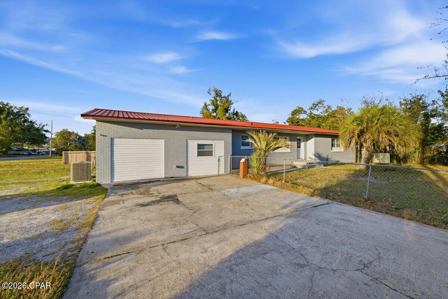 Welcome to this stunning, spacious home featuring 4 bedrooms and 3 full bathrooms. Situated in a beautiful, quiet neighborhood, this completely remodeled solid brick home offers a nice curb appeal and high-end craftsmanship. Brand new kitchen, bathrooms, HVAC, windows, flooring, and a newer metal roof.
This home is perfect for multi-generational living in-lieu of its size, spacious nature and thoughtful architecture. A dedicated section of the home, having its own means of ingress and egress, would serve as a mother-in-law suite with its own private kitchen and bathroom, but could also be used for short or long term rental purposes to maximize income and/or utility. Please listen to this: beneath the nearly 2000 sq ft main living areas, this property boasts a well-lit lower level or basement that is heated and cooled, thereby providing an additional 1200 sq ft of ample space for a game room (pool tables, table tennis, x-box consoles, etc.), home movie theater, home office, toy/play room, storage, or even as a shelter from the stormy elements!! It is endowed with several large insulated windows that let in natural light. This singular feature of this property is an absolute rarity in this part of the world. In a nutshell, this home allows endless possibilities and unparalleled versatility. The living room's French doors lead to an enclosed, screened back porch for pleasant outdoor views and natural light, providing ample relaxation to watch the sunset while sipping your favorite drink. It then leads outside to the sprawling backyard all around the house, having more than enough room for any exterior ideas such as a pool, garden, pole barn, or a full oasis. A few palm trees already adorn the front of the property. 

The features and benefits go on and on. The property is a corner lot and is accessible via 2 separate entrances (one from each of the adjoining streets), thereby providing ample parking for any number of cars, RVs, or boats you may have. You would have no fears about bringing the party home. This special property is located at the heart of the city, just minutes from white sandy beaches, hospitals, shopping, and dining. And at this price, there is simply nothing else like it in the area. Make it yours!