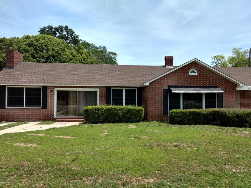 Well maintained brick home on corner lot, downtown Bonifay. Home has just been remodeled with new architectural shingle roof, New A/C unit inside and outside, freshly painted and new floor coverings. Also has new appliances in kitchen. Has very large den with fireplace, and large living room with fireplace. This house is move in ready, just bring your furniture.  All this on a large city lot close to all amenities. Located less than a hour from Panama City Beach.