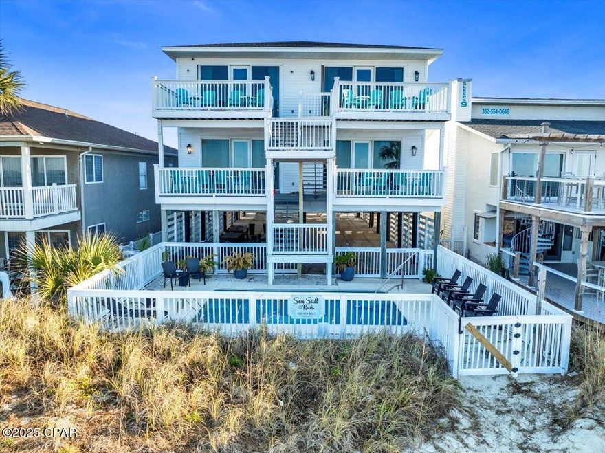 Welcome home to your beachfront paradise in Panama City Beach!  With a spacious 5,400 square feet of interior bliss, this sprawling property boasts an impressive eight bedrooms, eight bathrooms, and four separate kitchens making it a haven for large families or a savvy investor's dream. Recently renovated, this ''rental machine'' grossed nearly $400k in 2024, with over $200k in future bookings for 2025, proving it's not just a home—it's an investment. You'll delight in unparalleled Gulf views and have ample parking for all your beach gatherings. The property is ideally positioned near St. Andrews Park for outdoor fun, while convenient amenities like Pier Park are just a short drive away. Forget cramped living; this is your spacious slice of paradise, priced competitively to boot, with perhaps a little room for some sandcastles on the side! Take the plunge into luxurious coastal living.