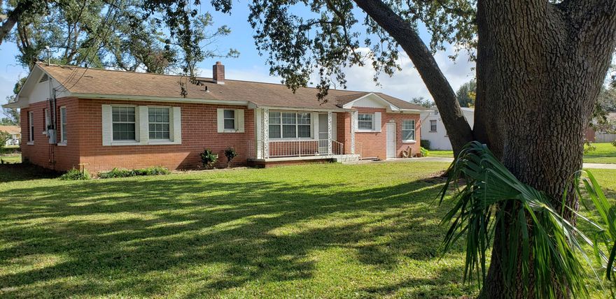 Back on the Market! Majestic oaks adorn this 3 bedroom 2 bath brick home. Located in the well established neighborhood of Pretty Bayou, on a large lot, and centrally located. LOTS OF POTENTIAL! Kitchen and baths need updating, and the price is set to reflect these upgrades. The property has rear access through a city maintained alley way, which enters the 2 car garage and workshop that is enormous! The square footage under roof is actually doubled by this attractive feature, with over 1300 sq ft by itself. A great opportunity for both an investor or a family looking to upgrade a fantastic home to their personal taste.