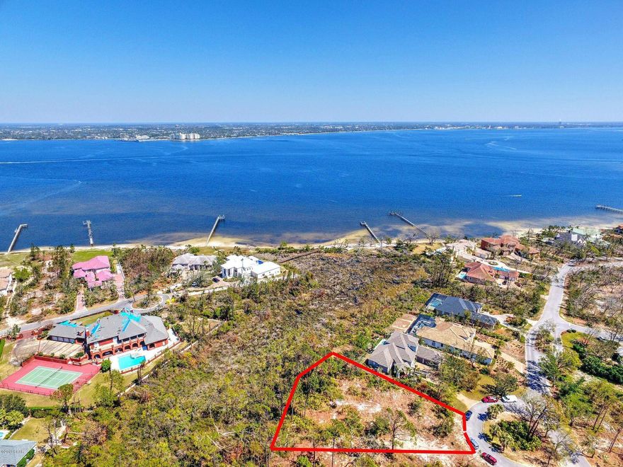 Bay Views!  Build your dream home and enjoy Bay Views! This incredible lot has just been cleared and is ready for you to build your forever home on now!  The perfect ''cul-de- sac'' location in a gated community in Panama City Beach. The Preserve on the Bay is a Premier Bay Front community in Panama City Beach with 24 hour security and located near great shopping, restaurants, Bay Point golf course, and of course the world's most famous beaches!  Easy to walk lot now and see the bay views and great potentials for this large lot! Call today for your showing!