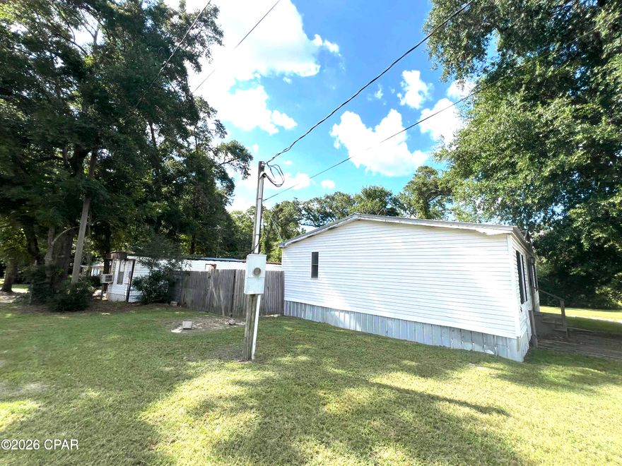 Owner Financing available with 50% down. This property features 3 Mobile homes being a 1993 - 3 bed/2 bath Doublewide, 1990 - 2 bed/1.5 bath singlewide, and 1974 3 bed/1 bath singlewide. All roofs are solid with no leaks. One home can be move-in / rent ready with minimal repairs and the remaining homes do need more work, however once completed these homes could bring in over $3,000 in rental income a month. These homes are located 45 minutes North of Panama City Beach with the direct area seeing major growth and improvements including new paved streets, 4 lane highway expansion, and new development of a golf resort in Vernon growing the local rent demand. The homes are on city water with septic. Property is being sold as-is with no repairs. Buyer to verify all details regarding the property, subdividing parcels, zoning, and square footage.