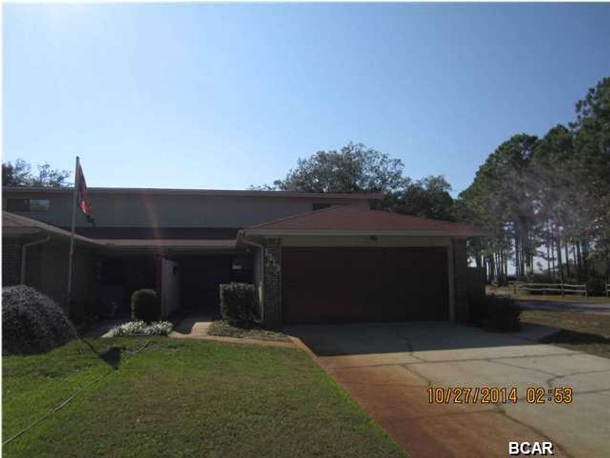 Attached living offers a small yard with a common dock on the canal shared between all 5 duplexes on this cul-de-sac. This unit is the end unit and has a great view of the park across the street and some real nice views of the bay. Nice detached storage unit has electricity and could serve as a good workshop. The garage has been finished complete with carpet, ceiling fan and sheetrock, but the garage door is still in tact and could easily be converted back to a garage & used as a top notch garage (extra special for a motorcycle) or extra living space. Sliding glass doors lead to a covered porch but the screen needs replaced. Prior to seller receipt and approval of the full title package from foreclosure, title to the property will be conveyed by a quit claim deed.