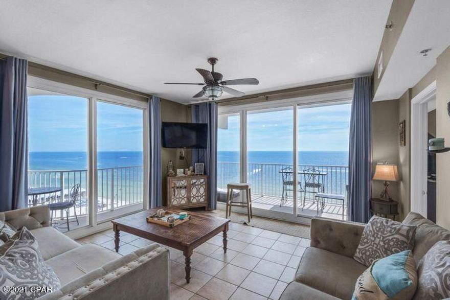 Your GULF FRONT Destination has arrived! This rare to find corner/end unit boasts breathtaking views of the gulf, the beach and pool from its deluxe-size wrap around balcony. Your friends, family and vacationing guests will love the gorgeous kitchen that showcases granite countertops, white shaker cabinets, and stainless steel appliances. NO CARPET - Custom tile throughout. Living area is complete with upscale designer décor and beautiful Ariel beach views. Master bedroom features a private entrance on to the balcony. As added bonus, you have a dedicated parking spot located right in front of your unit - NO ELEVATOR NEEDED! Rental Machine! Shores of Panama is an incredible destination that features Florida's largest lagoon pool and pool deck, beachside hot tub, sauna, steam room, spa+more