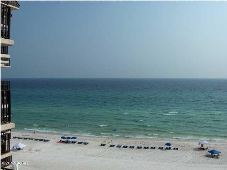 Gorgeous 3BR gulf front condo, completely re-modeled,20x20 ceramic tile, crown molding, mirrored walls, custom drapes, custom cabinets, granite countertops. Located at the desired Pelican Walk Condominiums, featuring heated pool, racquetball, hot tub, and white sandy beaches! Walking distance to shopping, dining and entertainment. Must See !