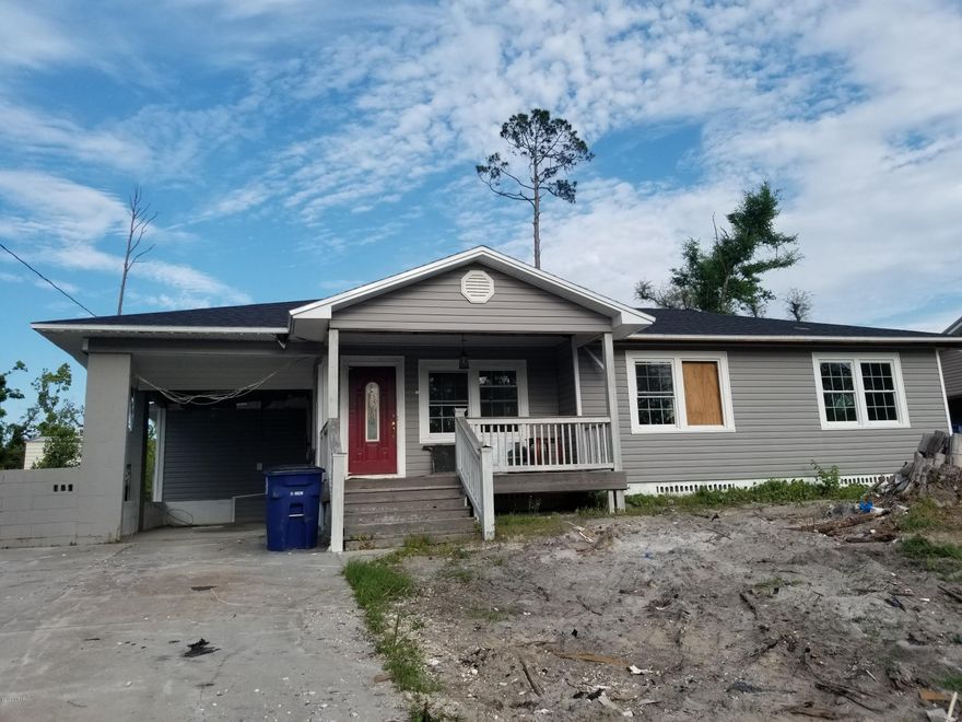 ATTENTION INVESTORS! This home is located in the COVE and is ready to shine again. The home has been gutted and is ready to be put back together.  There is a large storage building in the backyard as well.  This home will sell quickly once complete. Don't miss out on this amazing opportunity for your next flip.