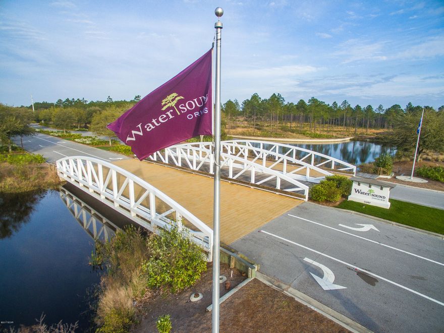 This is an incredible opportunity to build your own custom home in the new phase of the Watersound Origins community! This lot will back up to a pond and natural area for a relaxing view! The Watersound Origins community is a family-friendly neighborhood with a wide variety of amenities including the Village Commons pool & fitness center, dock access to Lake Powell, unlimited golf with no green fees (cart fees apply) at the Origins Golf Course, and 15% discount on all food & beverages at Fish Out of Water and Gathering Spot & Sushi Bar (both at the WaterColor Inn). Ask your sales Agent about St. Joe Club & Resorts membership opportunities. Construction must commence within 36 months from closing of lot with completion with 12 months from construction start date.