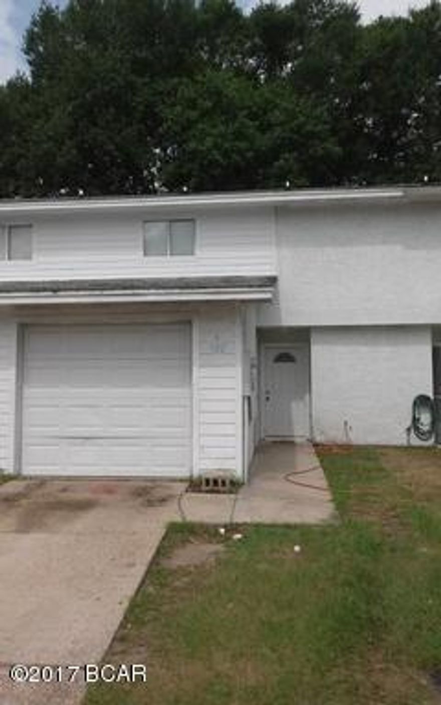 Spacious two story town home, located in Lynn Haven, with fenced yard and 1 car garage. This well kept home offers 3 beds, 2.5 baths and a spacious living and dining area with breakfast bar. All bedrooms are located upstairs and master includes a master bath and two closets.