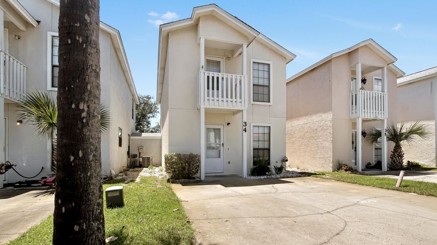 CURRENTLY UNDER CONTRACT, SELLER ACCEPTING BACKUP OFFERS!! This is the one! Updated 2 bdrm/2.5 bath detached townhome in a condominium complex. Granite countertops, stainless steel appliances, tile floor throughout and low maintenance. Private Patio and balcony off of Master bdrm. New roof. Ideal for Investors or Full Time Residence. You can not beat this location, Located in a small complex right across the street from the beach, 2 pools, clubhouse, low HOA fees, all within walking distance of shops and restaurants. HOA covers your exterior maintenance, exterior insurance, cable, water, garbage, lawn care...just go to the beach and relax.