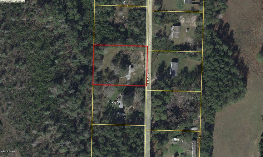 Great 1 acre parcel of land with septic, electric, and a shared well with neighbor to the left of property. The mobile home will be removed to make this a vacant lot ready to build on or move your new mobile home on. Youngstown is a quiet rural community that is close enough to all activities that Panama has to offer,but also far enough away to enjoy the tranquility of the country life. Just 25 minutes to the World's most beautiful beaches and the fresh crystal clear springs of Econfina. This property needs you and your dream home. All info is believed to be accurate. If important, buyer should verify.