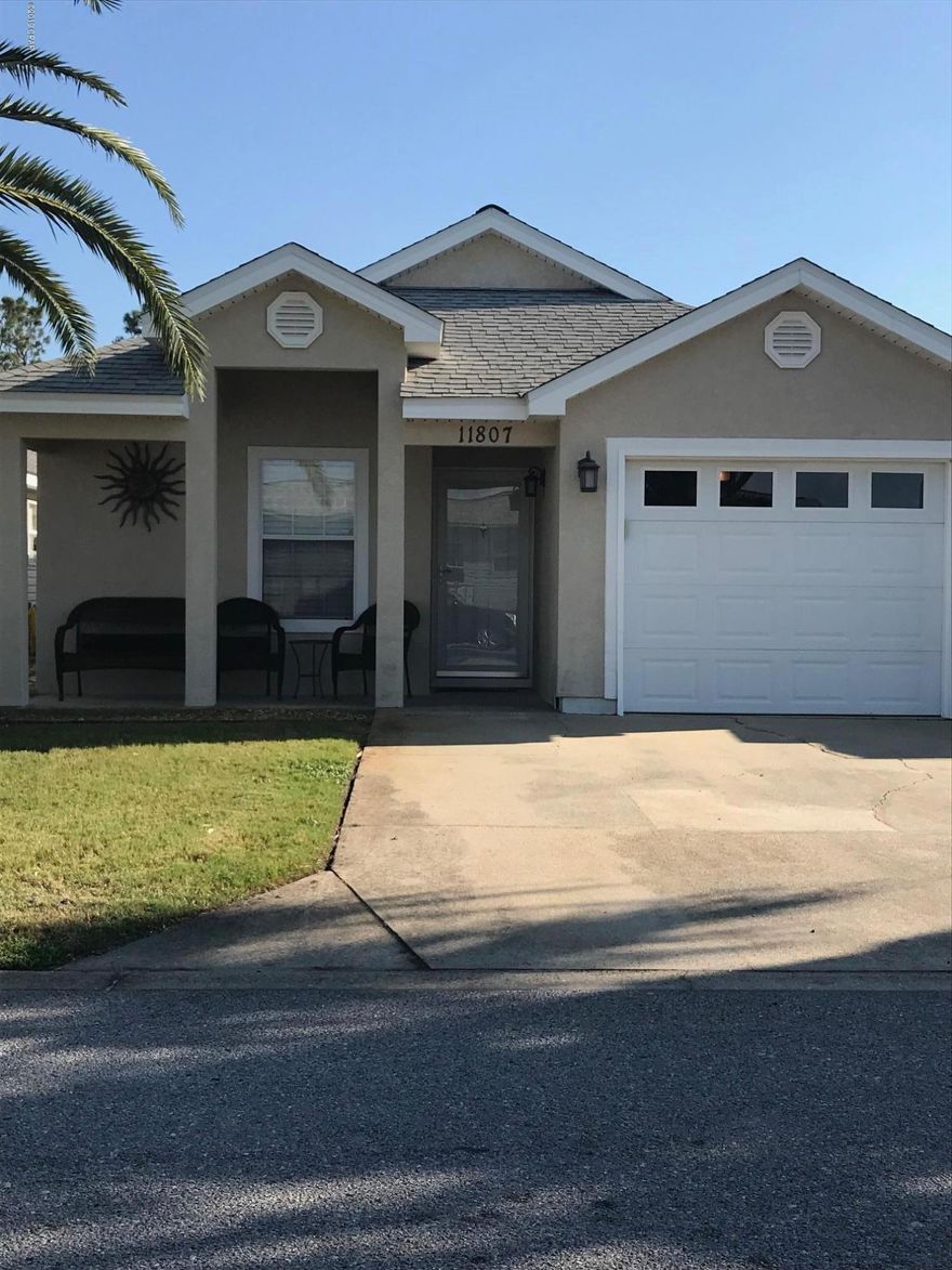 Beautifully redecorated kitchen with granite countertops and all new appliances. New light fixtures, new sink/cabinet in guest bath.. All flooring has been replaced with ceramic tile planks for low maintenance. Newly repainted inside and one of the few on the pool side

Near the guard gate for easy access. This home looks brand new . Is currently  used as a 2nd home
